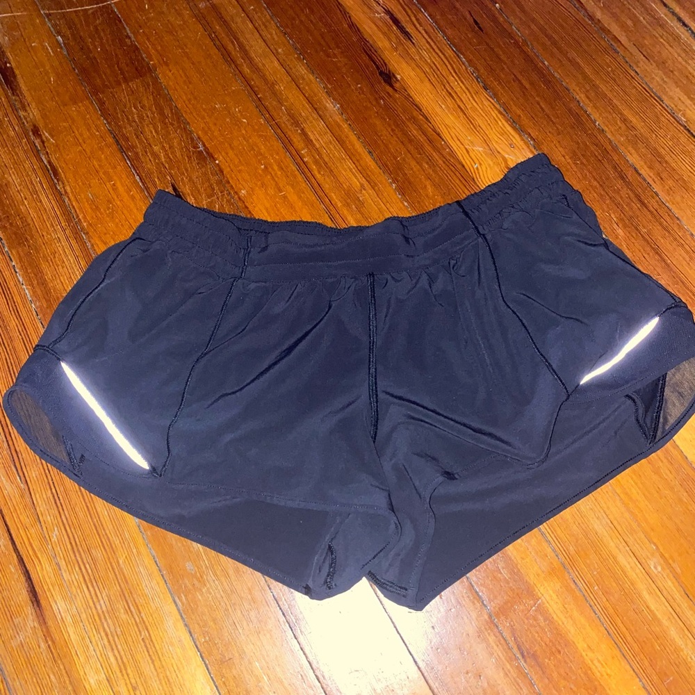 Black size 12 lululemon hotty hot shorts low rise